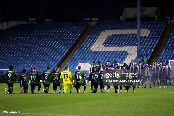 Kasey Palmer and team mates of Coventry City take a knee prior to the Emirates FA Cup Fourth Round match between Sheffield Wednesday and Coventry...