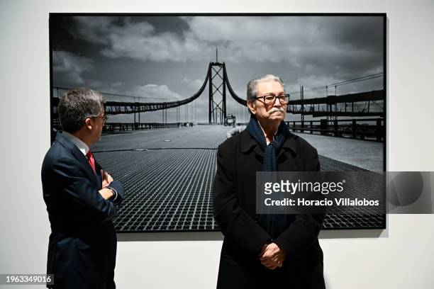 Lisbon Mayor Carlos Moedas and Portuguese photojournalist Eduardo Gageiro stand in front of one of the iconic photos on the opening day of "Factum",...