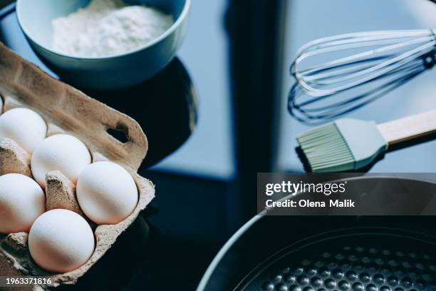 baking concept. flour and eggs on a dark background, copy space - close up bread roll black backdrop horizontal stock pictures, royalty-free photos & images