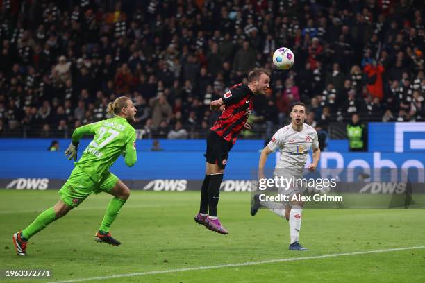 Mario Goetze of Eintracht Frankfurt scores their sides first goal past Robin Zentner of 1.FSV Mainz 05 during the Bundesliga match between Eintracht...