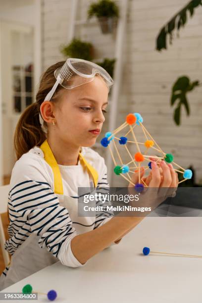 girls making geometric shapes, engineering and stem concept - school project stock pictures, royalty-free photos & images