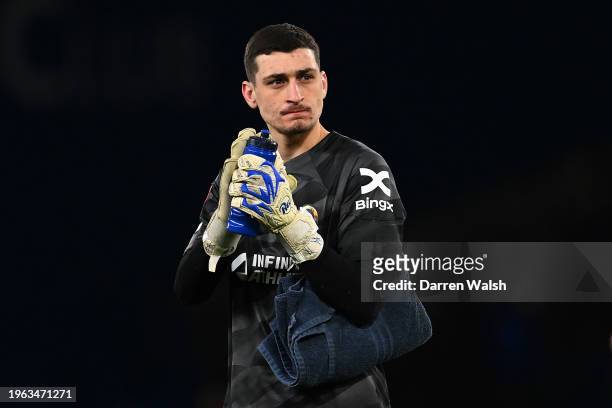 Djordje Petrovic of Chelsea applauds the fans at full-time following the teams draw in the Emirates FA Cup Fourth Round match between Chelsea and...