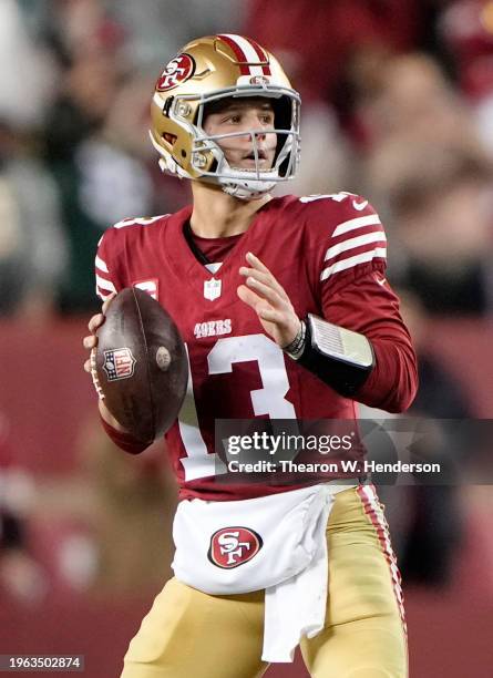 Brock Purdy of the San Francisco 49ers looks to pass against the Green Bay Packers in the NFC Divisional Playoffs at Levi's Stadium on January 20,...