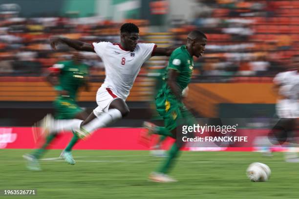 Cape Verde's midfielder Joao Paulo fights for the ball with Mauritania's forward Sidi Bouna Amar during the Africa Cup of Nations 2024 round of 16...