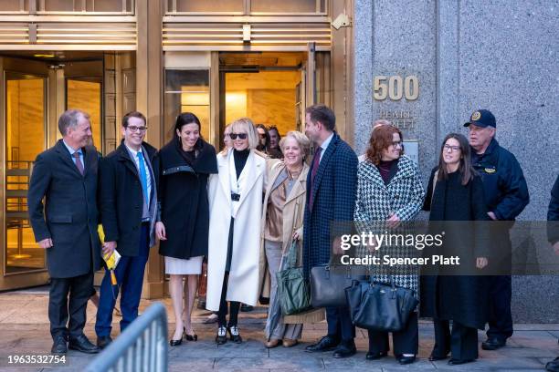 Jean Carroll departs a Manhattan federal court with members of her legal team, including Roberta Kaplan , at the conclusion of her defamation suit...