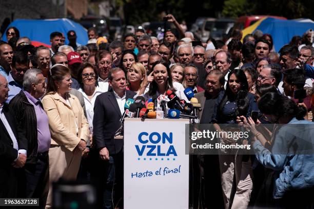 Maria Corina Machado, Venezuelan opposition's presidential candidate, center, speaks during a press conference in Caracas, Venezuela, on Monday, Jan....