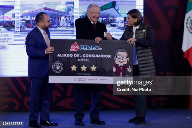 President of Mexico, Andres Manuel Lopez Obrador, is giving recognition to gas station businessmen during a press conference at the National Palace...