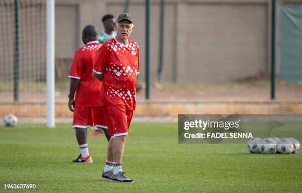 Burkina Faso's French coach Hubert Velud takes part in a training session at "Stade municipal" in Korhogo on January 29 on the eve of the round of 16...