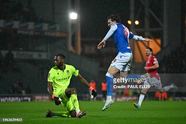 Blackburn Rovers' English striker Sam Gallagher shoots past Wrexham's English goalkeeper Arthur Okonkwo from distance to score their second goal...