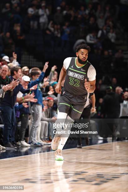 Karl-Anthony Towns of the Minnesota Timberwolves looks on during the game against the Charlotte Hornets on January 22, 2024 at Target Center in...