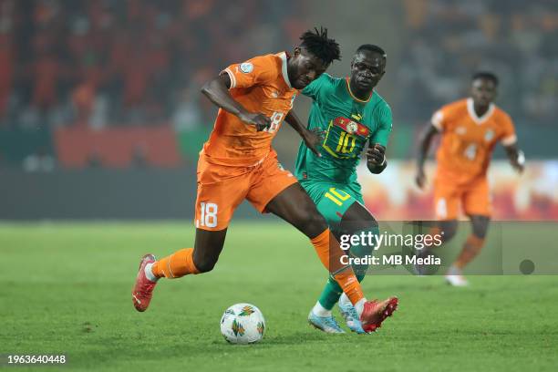 Yamoussoukro, IVORY COAST Ibrahim Sangaré of Côte D'Ivoire and Sadio Mané of Senegal during the TotalEnergies CAF Africa Cup of Nations round of 16...