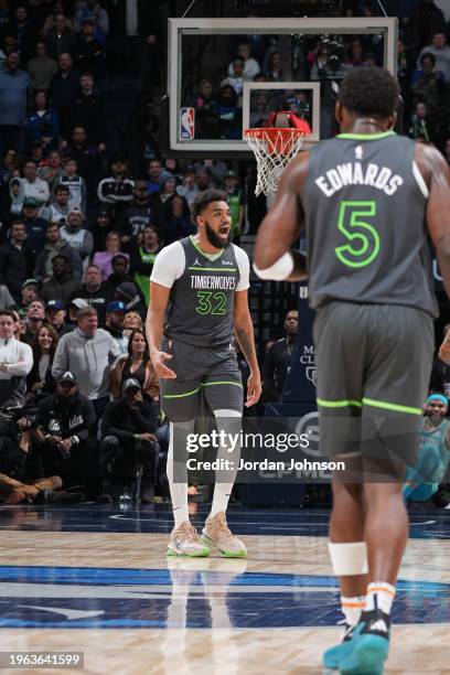 Karl-Anthony Towns of the Minnesota Timberwolves celebrates during the game against the Charlotte Hornets on January 22, 2024 at Target Center in...