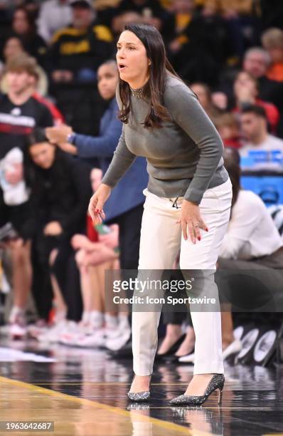 Nebraska head coach Amy Williams watches her team play during a women's college basketball game between the Nebraska Cornhusker and the Iowa Hawkeyes...