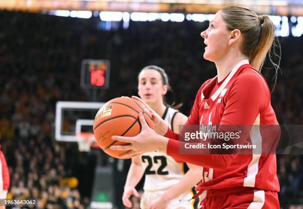 Nebraska guard Kendall Moriarty attempts a shot during a women's college basketball game between the Nebraska Cornhusker and the Iowa Hawkeyes on...