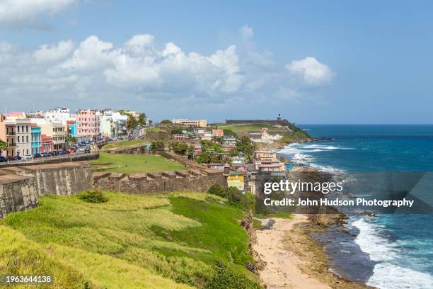 san juan island looking west along the coast of puerto rico - old san juan wall stock pictures, royalty-free photos & images