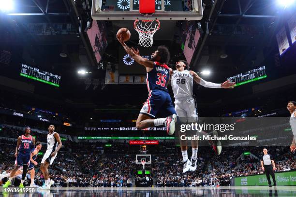 Marvin Bagley III of the Washington Wizards drives to the basket during the game against the San Antonio Spurs on January 29, 2024 at the Frost Bank...