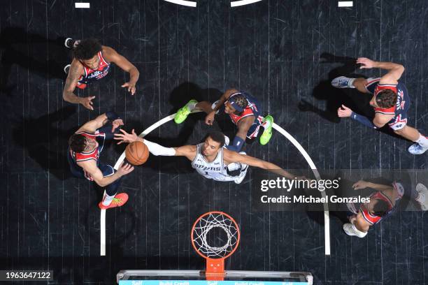 Victor Wembanyama of the San Antonio Spurs rebounds the ball during the game against the Washington Wizards on January 29, 2024 at the Frost Bank...