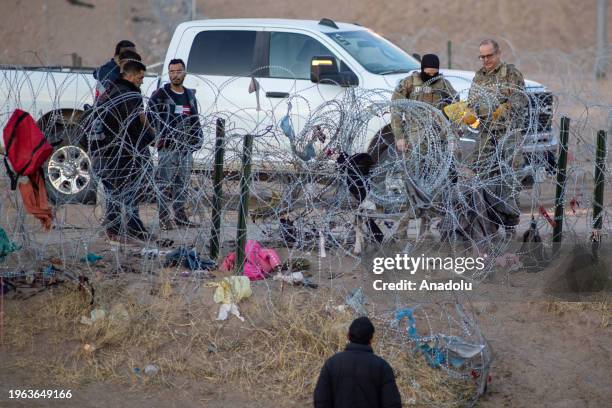 Crossing Razor Wire 1,673 Barbed Wire Border Crossing Stock Photos, High-Res Pictures, and ...