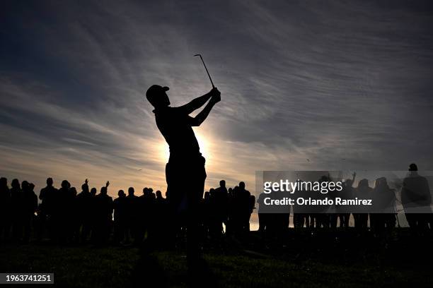 Joseph Bramlett of the United States plays his shot on the 17th hole during the third round of the Farmers Insurance Open at Torrey Pines South...