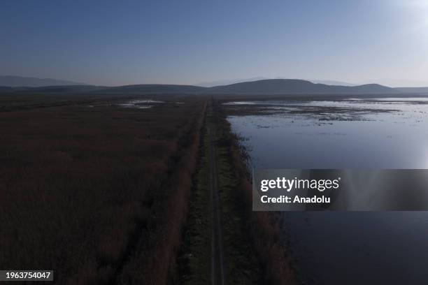 An aerial view of Izmir Bird Sanctuary hosting bird species such as flamingos, herons and pelicans, as well as mammals, including horses at the Gediz...