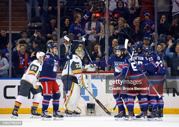 The New York Rangers celebrate a first period goal by Blake Wheeler against Adin Hill of the Vegas Golden Knights at Madison Square Garden on January...
