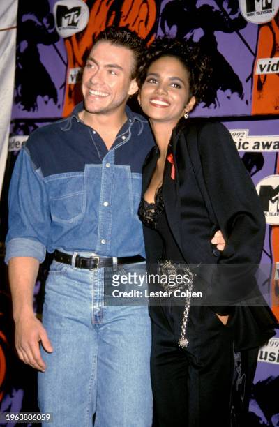 Belgian actor Jean-Claude Van Damme and American actress Halle Berry, pose for a portrait during the Ninth Annual MTV Video Music Awards at UCLA's...