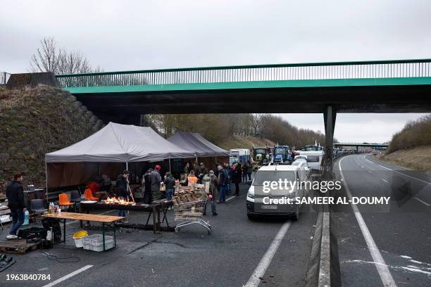 French farmers of the CR47 union stopped on the A16 highway next to the exit of Beauvais North, amid nationwide protests called by several farmers...