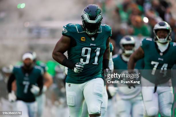 Fletcher Cox of the Philadelphia Eagles runs onto the field during team entrances before an NFL football game against the San Francisco 49ers at...