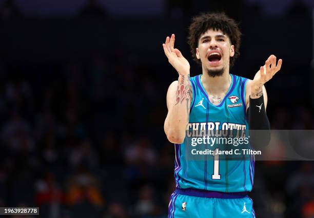 LaMelo Ball of the Charlotte Hornets reacts during the second half of the game against the Houston Rockets at Spectrum Center on January 26, 2024 in...