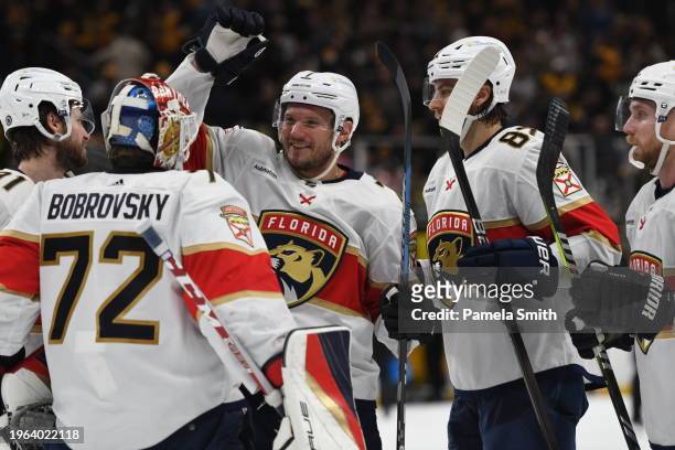 Dmitry Kulikov of the Florida Panthers smiles after the Panthers defeated the Pittsburgh Penguins in a shootout at PPG PAINTS Arena on January 26,...