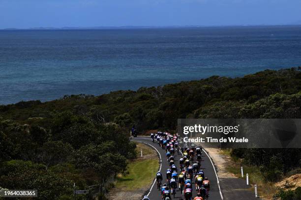 General view of the peloton passing near Bells Beach during the 7th Deakin University Elite Women´s Road Race 2024 a 140.8km one day race from...