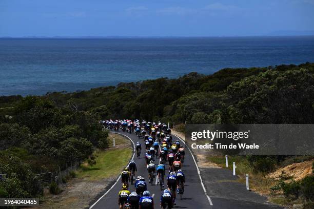 General view of the peloton passing near Bells Beach during the 7th Deakin University Elite Women´s Road Race 2024 a 140.8km one day race from...