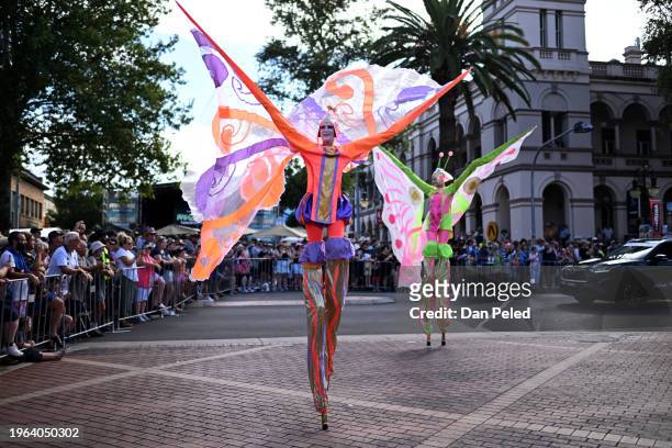 Street performers entertain the crowd during a parade on January 27, 2024 in Tamworth, Australia, during the Country Music Festival. Held in...