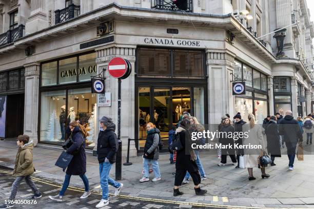 Members of the public pass Canada Goose's flagship store in Regent Street on 5th January 2024 in London, United Kingdom. There have been multiple...