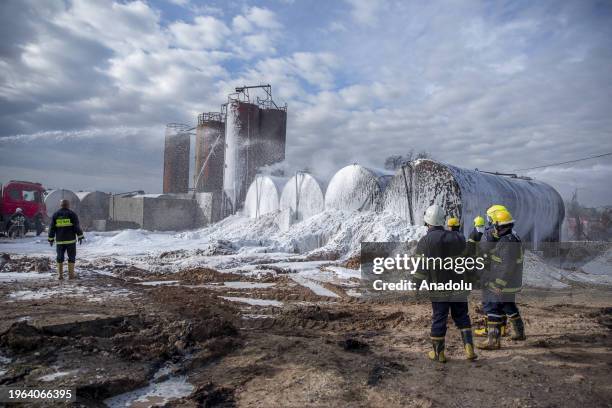 Firefighters work on extinguishing the fire broke out in an oil refinery on the Erbil-Gwer road in Erbil, Iraq on January 30, 2024. The fire, which...