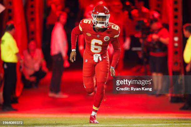 Bryan Cook of the Kansas City Chiefs runs onto the field during team entrances prior to an NFL football game against the Denver Broncos at GEHA Field...
