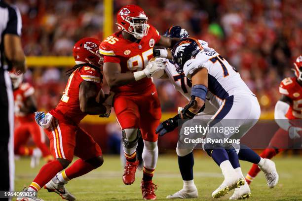 Chris Jones of the Kansas City Chiefs rushes the line of scrimmage during an NFL football game against the Denver Broncos at GEHA Field at Arrowhead...