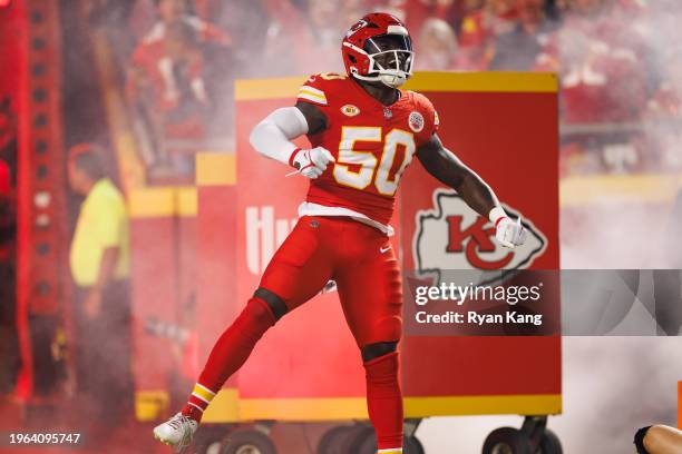 Willie Gay of the Kansas City Chiefs celebrates as he runs onto the field during team entrances prior to an NFL football game against the Denver...