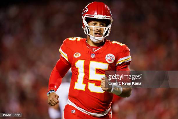 Patrick Mahomes of the Kansas City Chiefs reacts after the team scored a touchdown during an NFL football game against the Denver Broncos at GEHA...