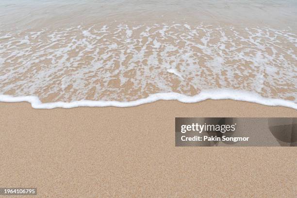 ocean wave with reflection on wet sand. - australia summer reflection foto e immagini stock