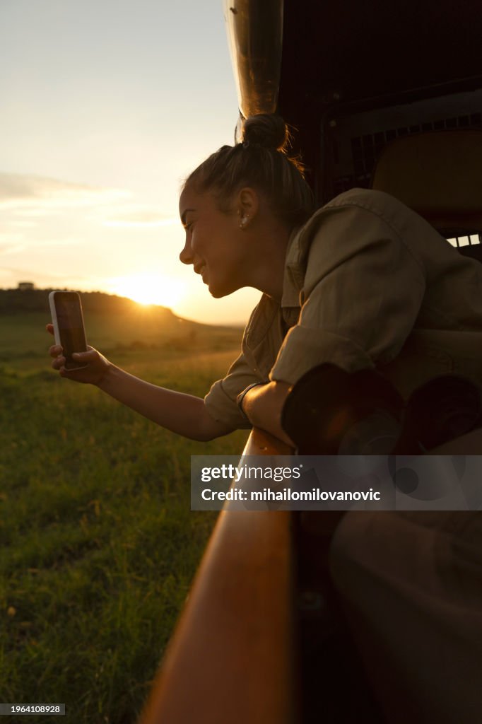 Taking photos on a safari sunset tour