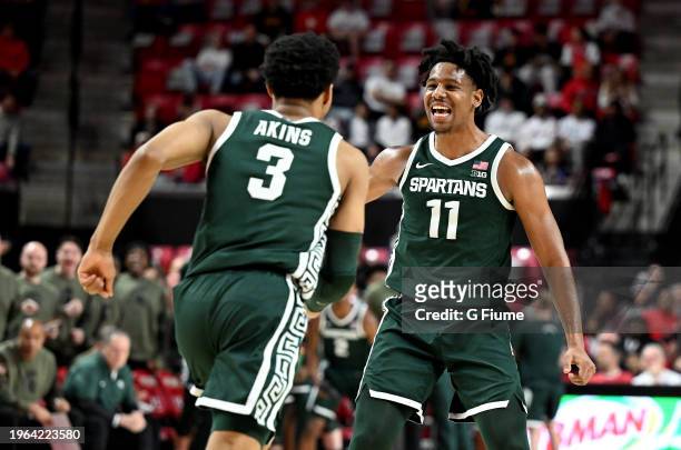 Hoggard of the Michigan State Spartans celebrates with Jaden Akins during the game against the Maryland Terrapins at Xfinity Center on January 21,...