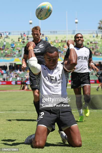 Viwa Naduvalo of Fiji celebrates crossing for a try during the 2024 Perth SVNS men's match between Fiji and New Zealand at HBF Park on January 27,...