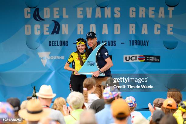 Rosita Reijnhout of The Netherlands and Team Visma Lease A Bike Women celebrates at podium as race winner with Cadel Evans of Australia Ex-...