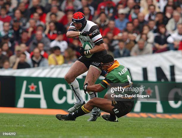 Trevor Brennan of Toulouse is tackled during the Heineken Cup match between Toulouse and Northampton Saints held on April 12, 2003 at Stade...
