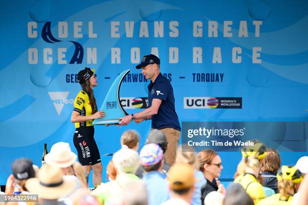 Rosita Reijnhout of The Netherlands and Team Visma Lease A Bike Women celebrates at podium as race winner with Cadel Evans of Australia Ex-...