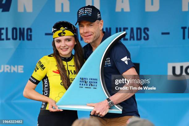 Rosita Reijnhout of The Netherlands and Team Visma Lease A Bike Women celebrates at podium as race winner with Cadel Evans of Australia Ex-...