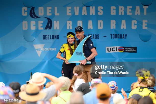 Rosita Reijnhout of The Netherlands and Team Visma Lease A Bike Women celebrates at podium as race winner with Cadel Evans of Australia Ex-...