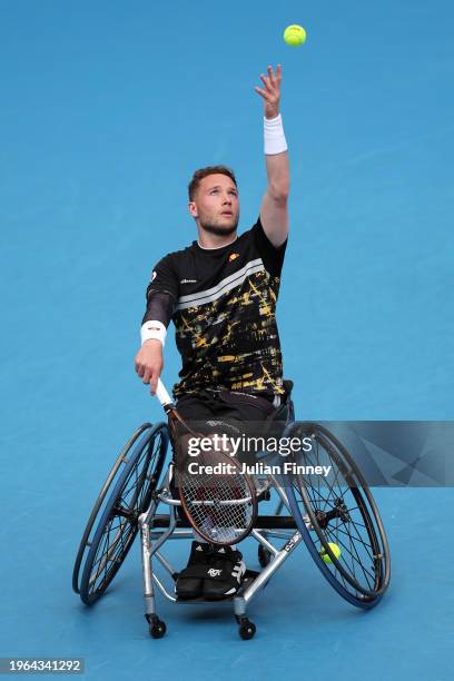 Alfie Hewett of Great Britain serves in their Men's Wheelchair Singes Final match against Tokito Oda of Japan during the 2024 Australian Open at...