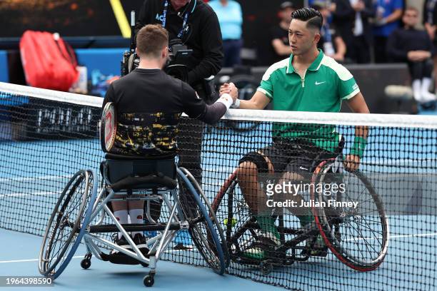Alfie Hewett of Great Britain and Tokito Oda of Japan embrace at the net following their Men's Wheelchair Singes Final match during the 2024...